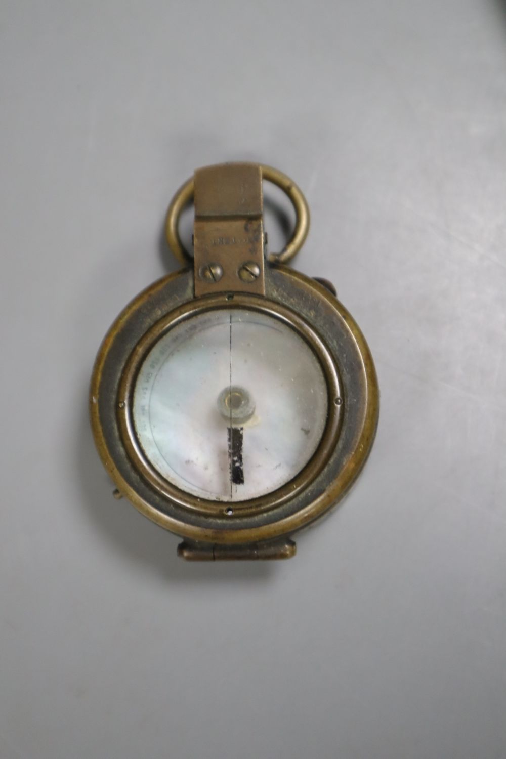 Two pocket compasses and two telescopes, one being by Dixey